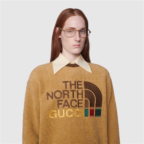 sudadera north face gucci.